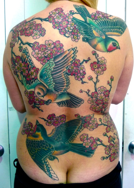 lower back tattoo cover up. Then she decided she wanted to do a cover up on her lower back so we added a